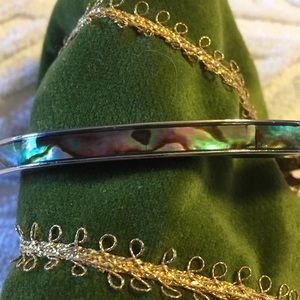 silver tone bracelet with abalone shell